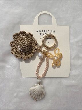 American Eagle Outfitters Brown Straw Flower & Gold Bead Shell Keychain